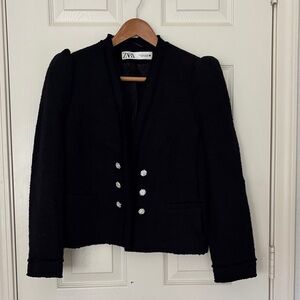 Zara black tweed like jacket with crystal like buttons. Has shoulder pads.